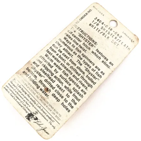 Luhr Jensen Shyster Třpytka, Nikl/Bílá, 3.5g, Trojháček s peřím, #12689