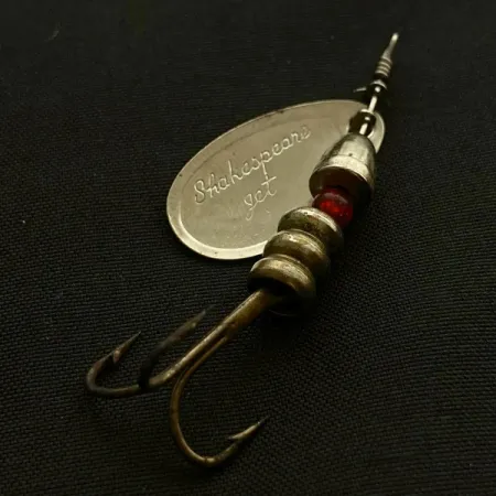 Shakespeare Jet, 4g, stříbrno-zelená, rotační třpytka #23505