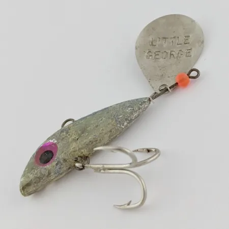 Mann's Bait Little George, 21g, niklová barva, tail spinner #24117
