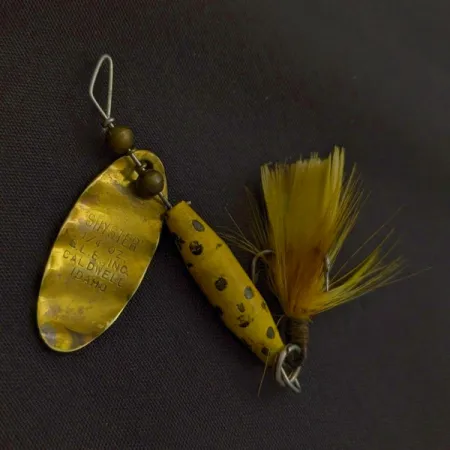 Glen Evans Shyster, 7g, žluto-zlatá, rotačka #24227